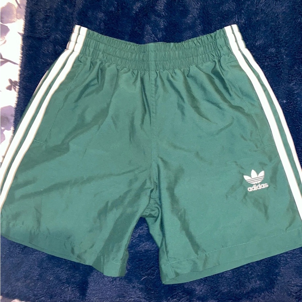 Green adidas shorts
